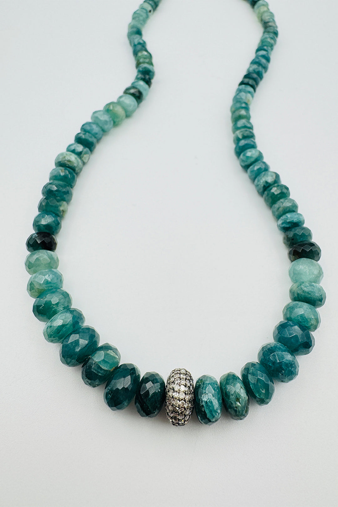 LARGE GRADUATED GRANDIDIERITE WITH DIAMOND DONUT BEAD NECKLACE